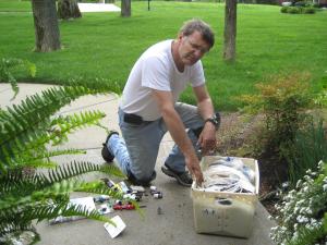 a Roseville sprinkler installation tech brings his equipment to the problem area