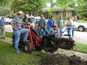 the Roseville irrigation repair team takes a break from an install